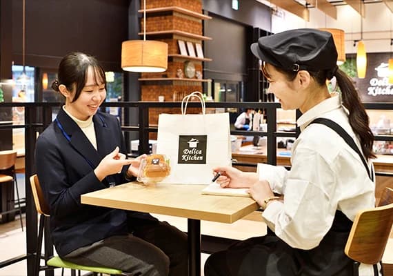 惣菜専門店での商談